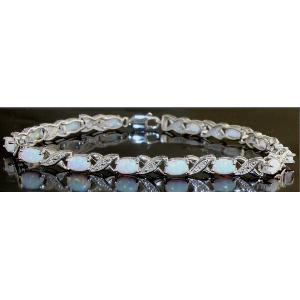 XO Infinity Bracelet Created Opal and Diamond Accent in Sterling Silver Setting